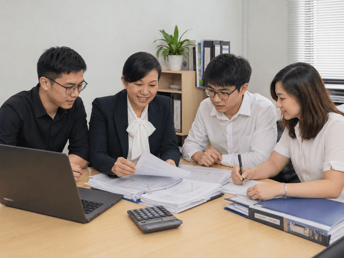 Rengo team reviewing client documents